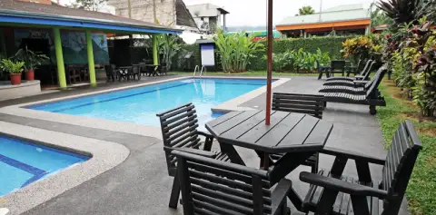 Pool area at San Bosco Inn Arenal
