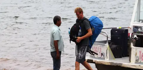 Getting Off Taxi-Boat-Taxi Arenal to Monteverde